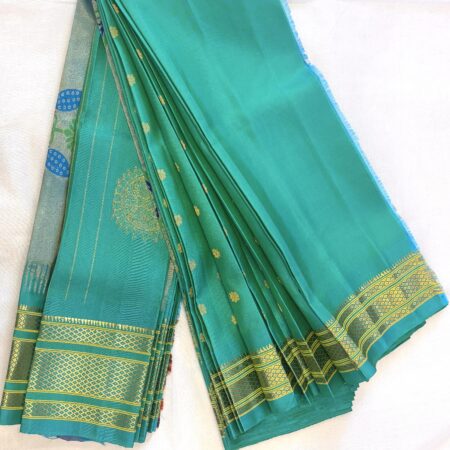 Narayanpet Silk Saree – Aqua Green Body with Gold Zari Buttas & Silver-Gold Peacock Pallu