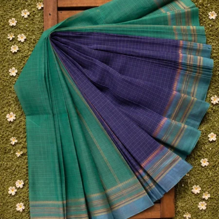Teal green Narayanpet handloom cotton saree with indigo pallu and zari striped border