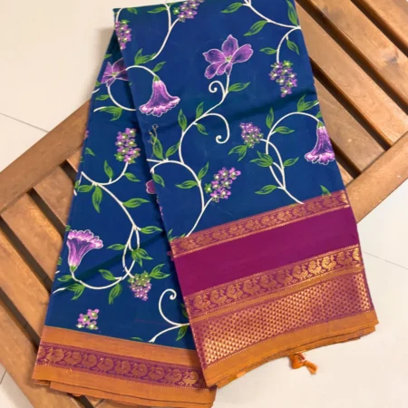 Royal blue Narayanpet handloom cotton saree with floral vine print and magenta zari border